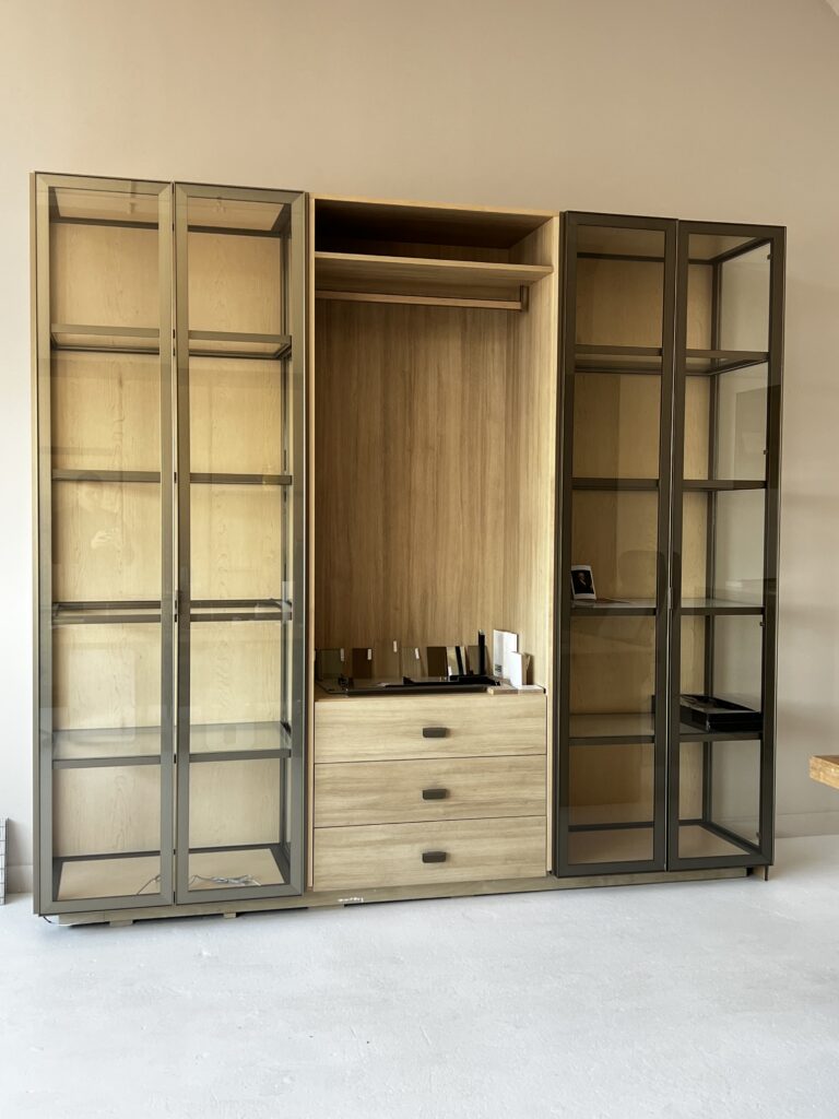 Aluminum-framed glass cabinet with drawers