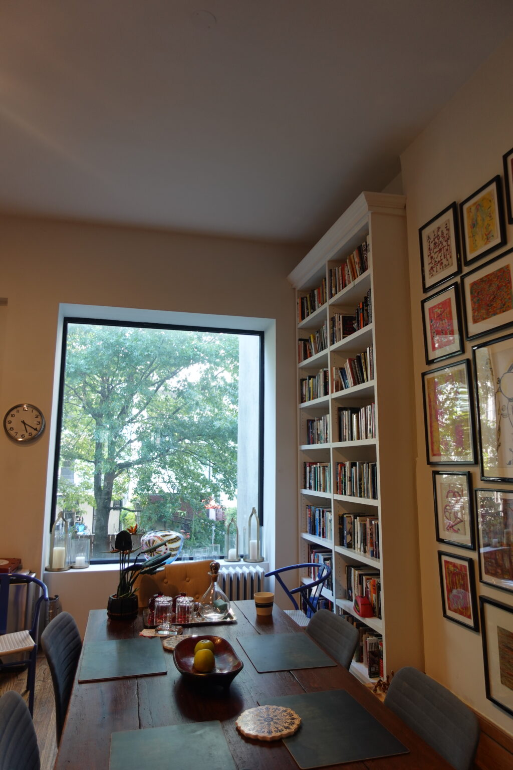 Built-in bookshelves around a window in a study